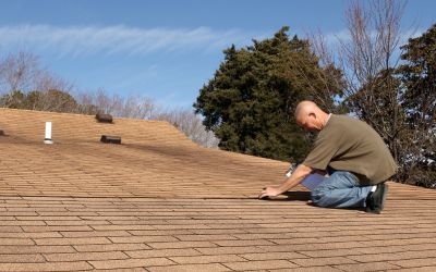 Roofing Contractor doing Roofing Inspection for Rochester Roofing Company