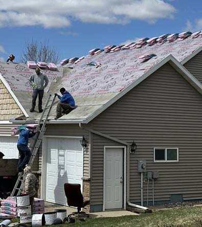 Gallery photo of new roofing being put on a residential home by Rochester Roofing, Inc. in Rochester, MN